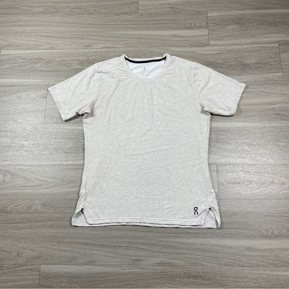 On Running shirt men’s size L beige.